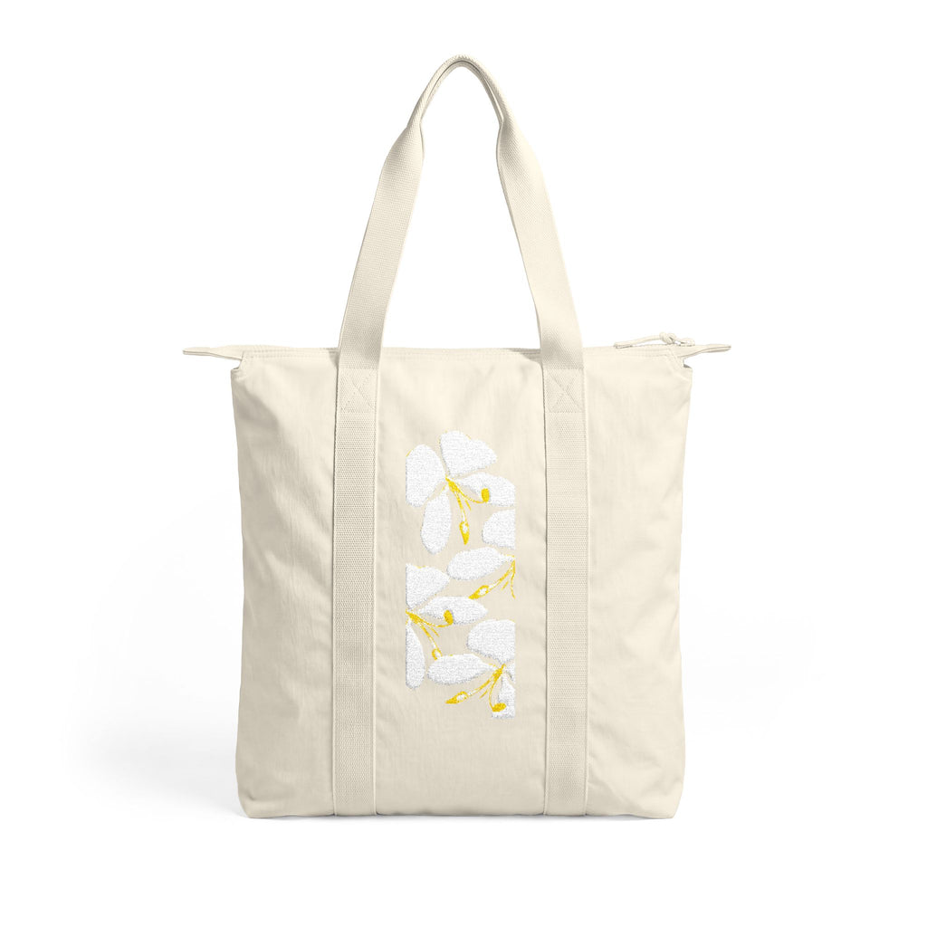 Floral Nomad Tote Bag — Black Carry-All with White & Yellow Blossom Stripe